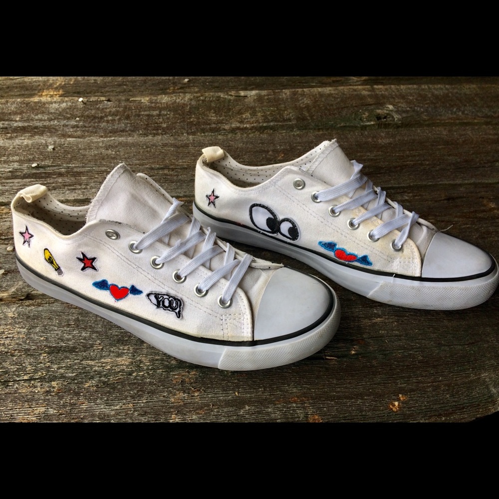 Size 11 women’s white sneakers with patches